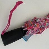 An umbrella with a sticky handle.