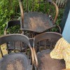 A collection of wooden dining chairs.