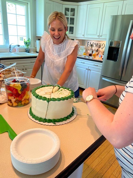 Cutting the cake.