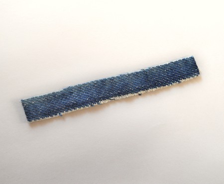 A strip of jeans material.