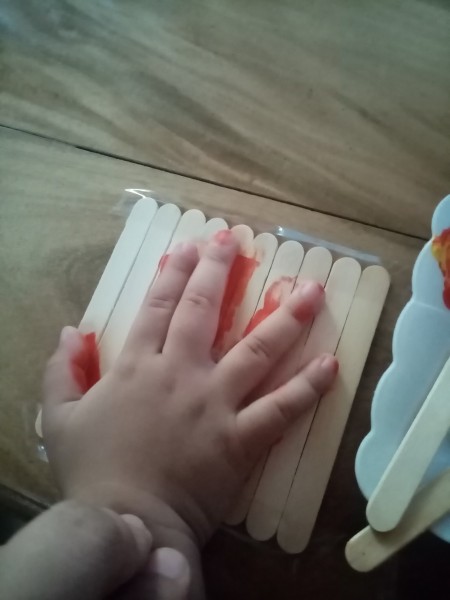 Adding a handprint to the center of the sticks.