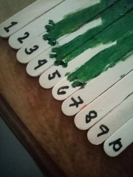 Adding numbers to the bottoms of the sticks.
