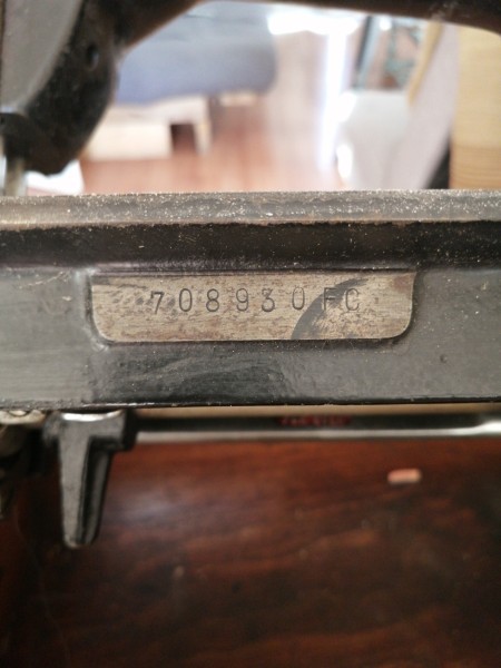 A serial number on a sewing machine.