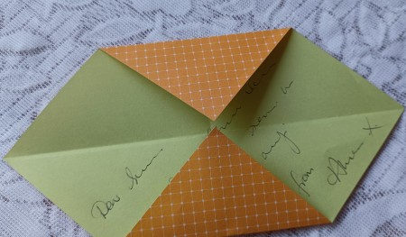 Folding the top and bottom corners down.