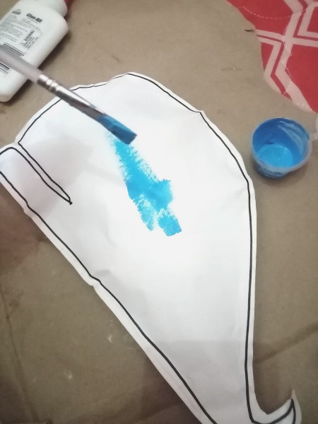 Painting the whale blue.