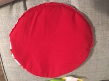 Sewing the fabric together.