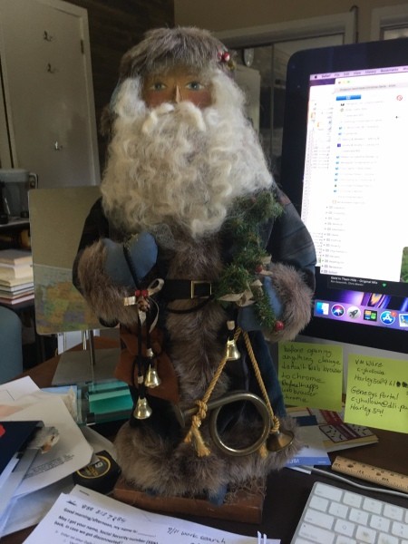 A doll resembling a nutcracker or Santa.