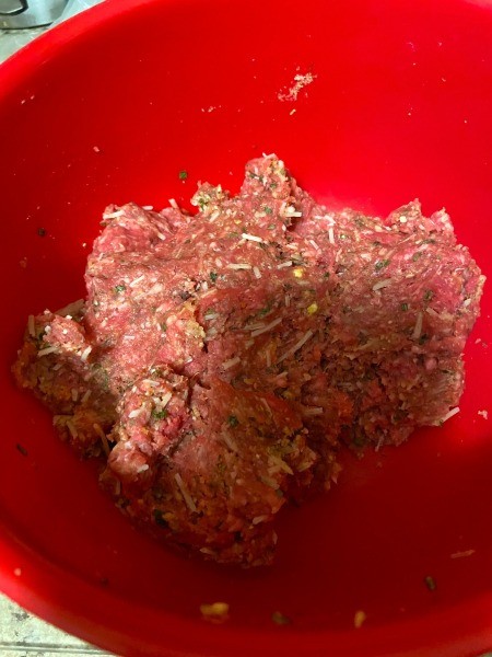 Mixing up the meatloaf.