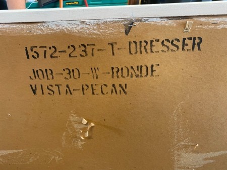 Information on the back of a Bassett dresser.