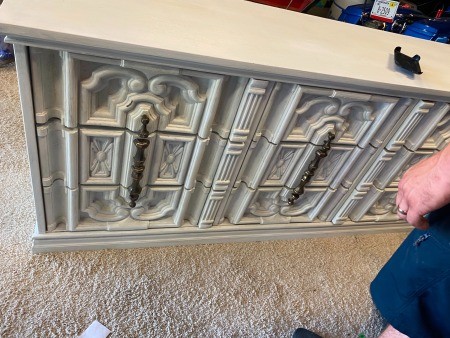 A Bassett dresser with an ornate front.