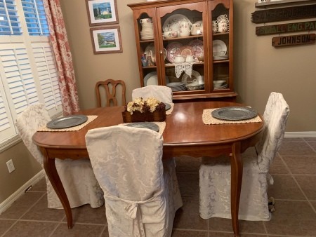A wooden dining room set.