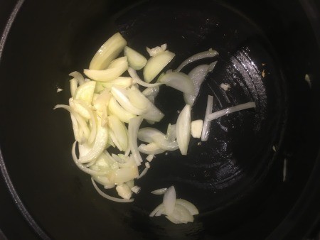 Poulet au Pastis (Chicken with Anise
Sauteing the onion in a pan.