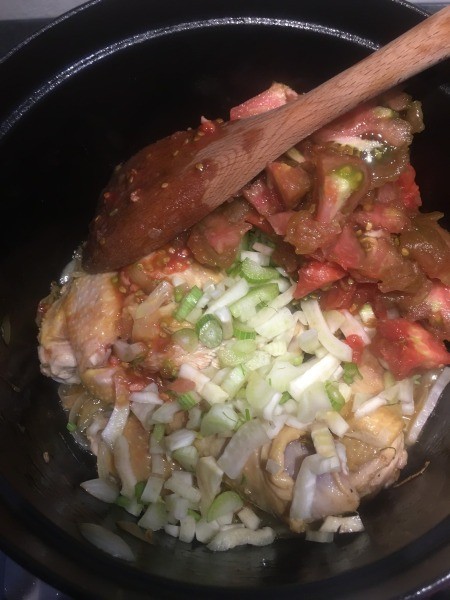 Adding the ingredients to the pan.