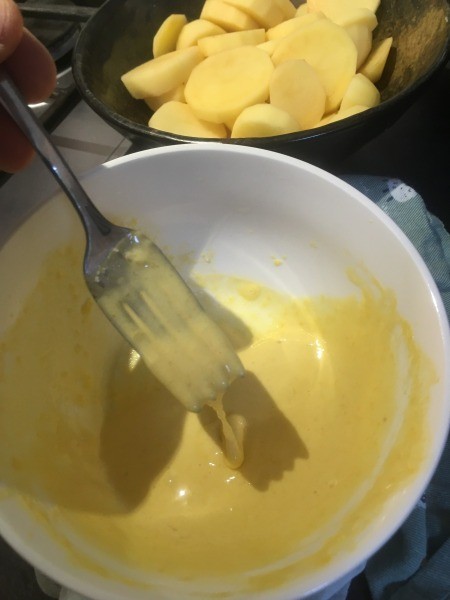 Making garlic aioli.Alcohol)