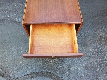 The drawer in a drop leaf table.