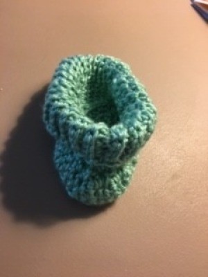 The completed crocheted booties.