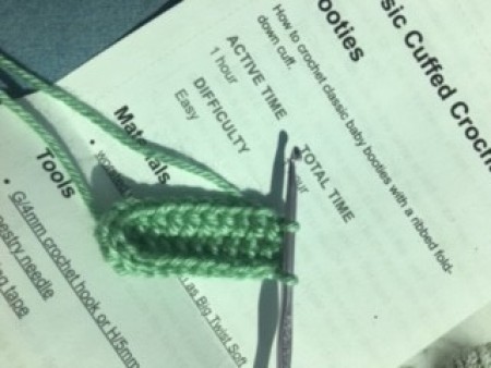 Continuing to crochet the booties.