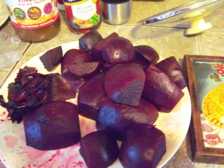A pile of cut up and cooked beets.