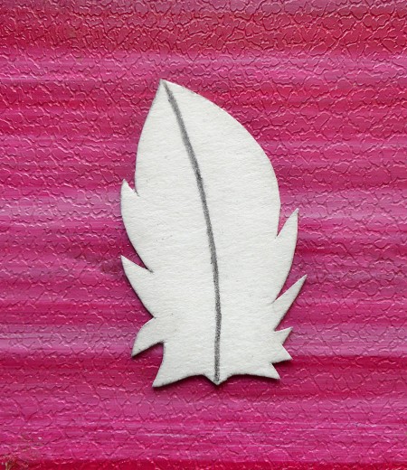 A feather template made from cardstock.