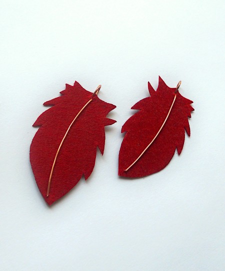 Attaching wire to the center of the feathers.