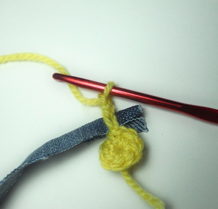 Continuing to crochet the coaster.