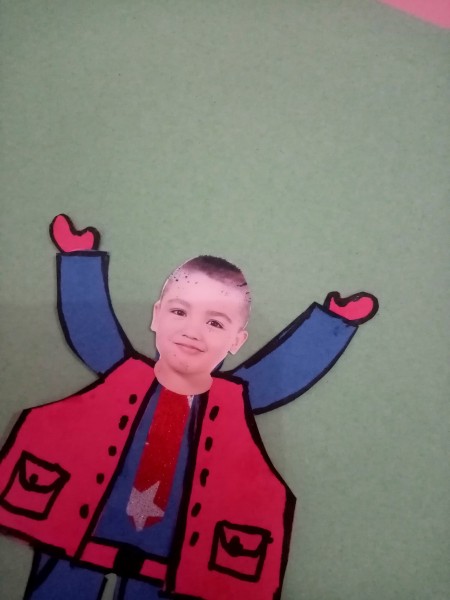 Attaching the head to the paper figure.