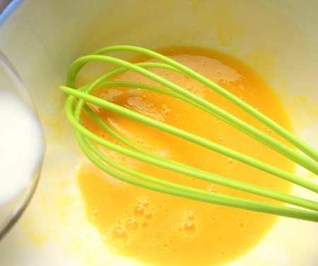 Beaten eggs in a bowl.