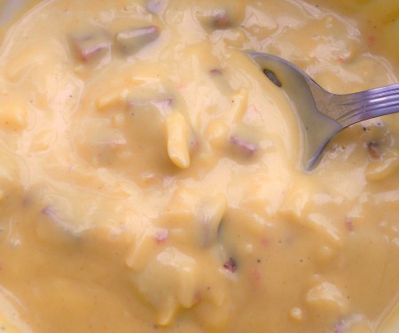 Mixing together the cheese muffin batter.