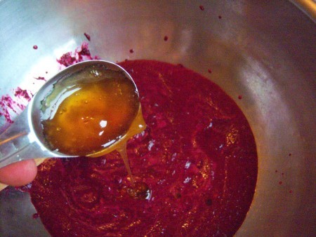 Adding ingredients to the bowl.