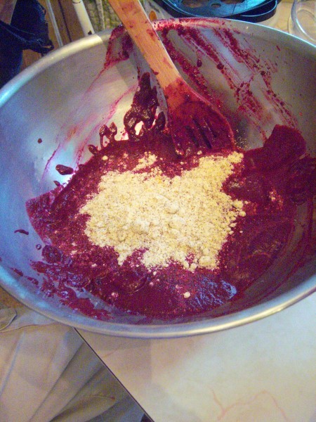 Adding ingredients to the bowl.