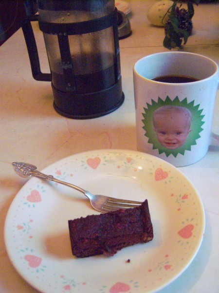 A slice of Almond Flour Chocolate Beet Cake on a plate.