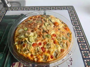 A finished zucchini tomato quiche.