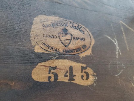 A marking and number on an Imperial Chair and Desk set.