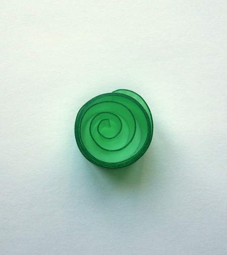 Rolling the strip in the other direction.