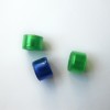 A collection of recycled plastic beads.