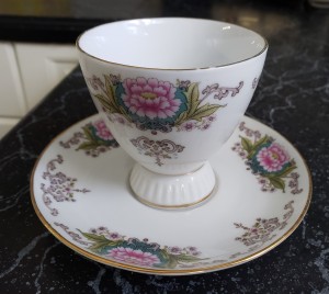 A painted china cup.