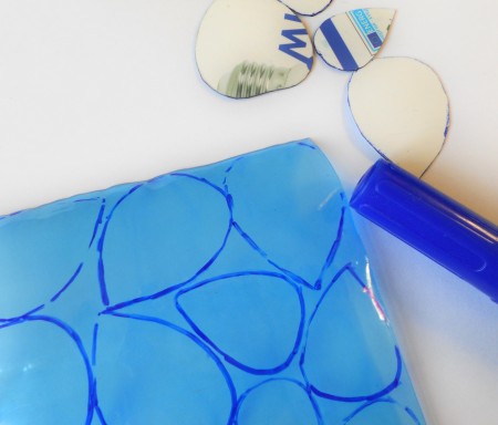 Tracing the templates onto a piece of plastic.