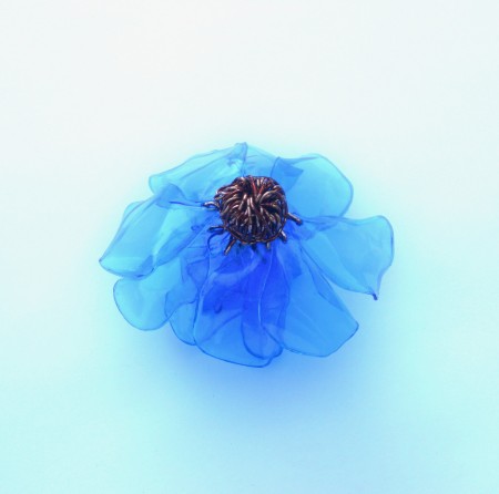 Cutting off the wires at the bottom of the flower.