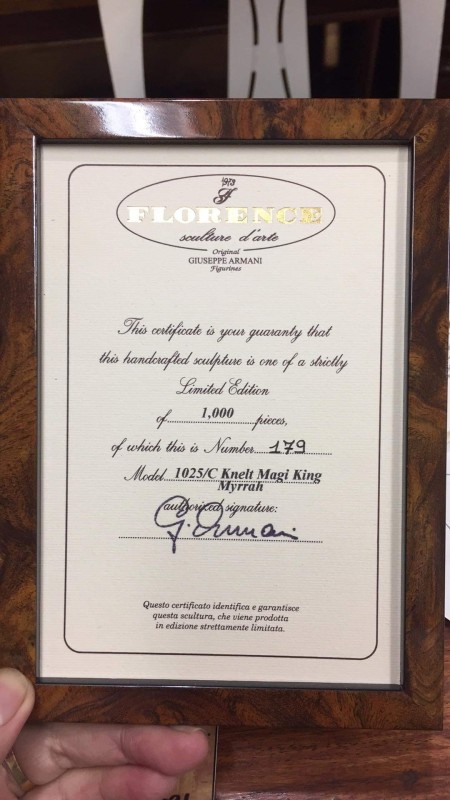 A certificate of authenticity for figurines.