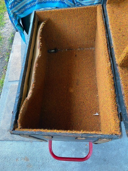 Inside a steamer trunk.