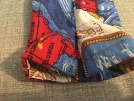 The ends of the fabric pieces.