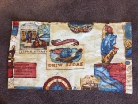 Using a decorative fabric to cover the bolster.