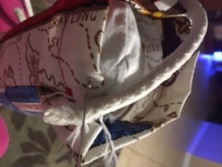 Adding trim to the bolster.