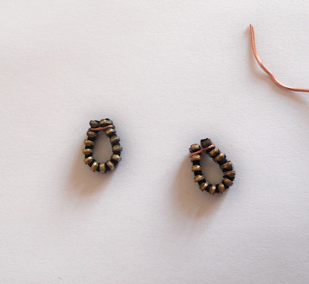 The earrings before the hooks are added.