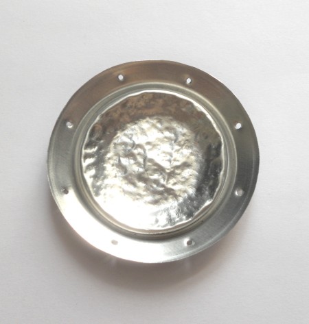 Adding holes to the sides of the can bottom.