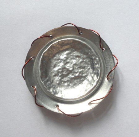 Wrapping wire around the edge.