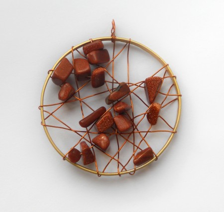 The completed beaded pendant.