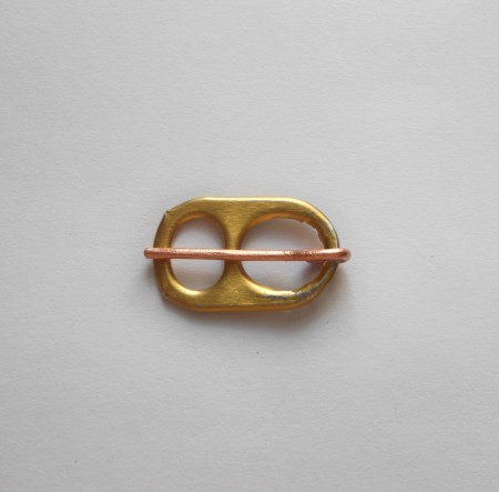 Attaching the wire to the tab.