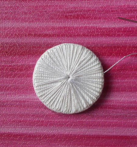 The brooch when the stitching is finished.