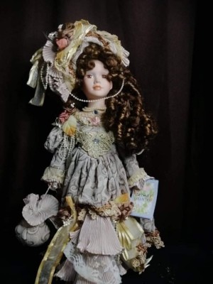 A decorative porcelain doll.